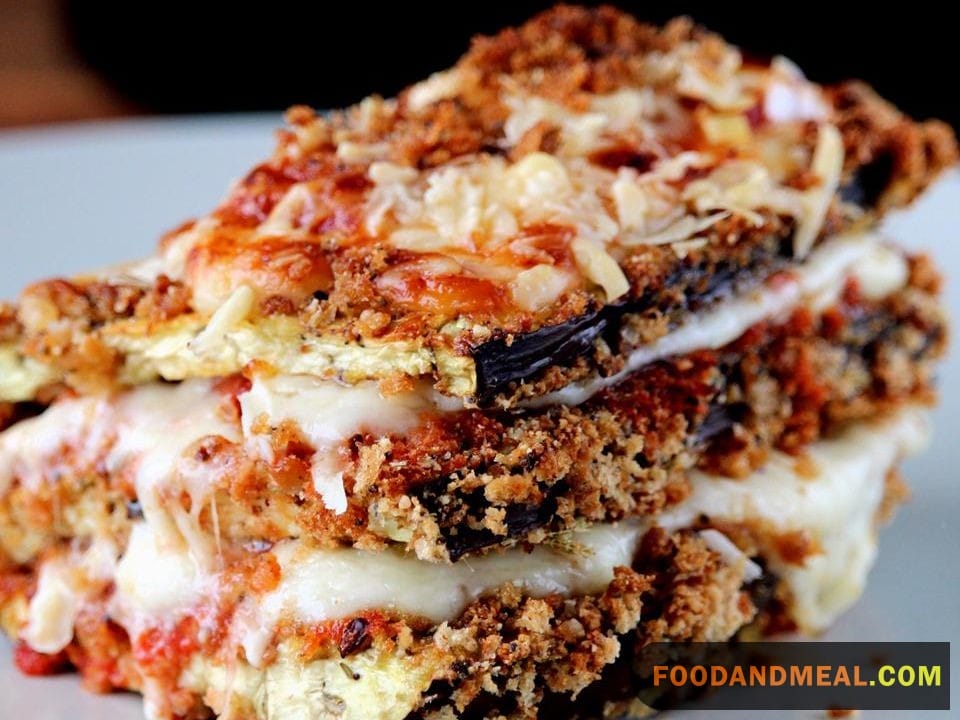 A slice of heaven: Cutting into the finished Eggplant Parmesan.