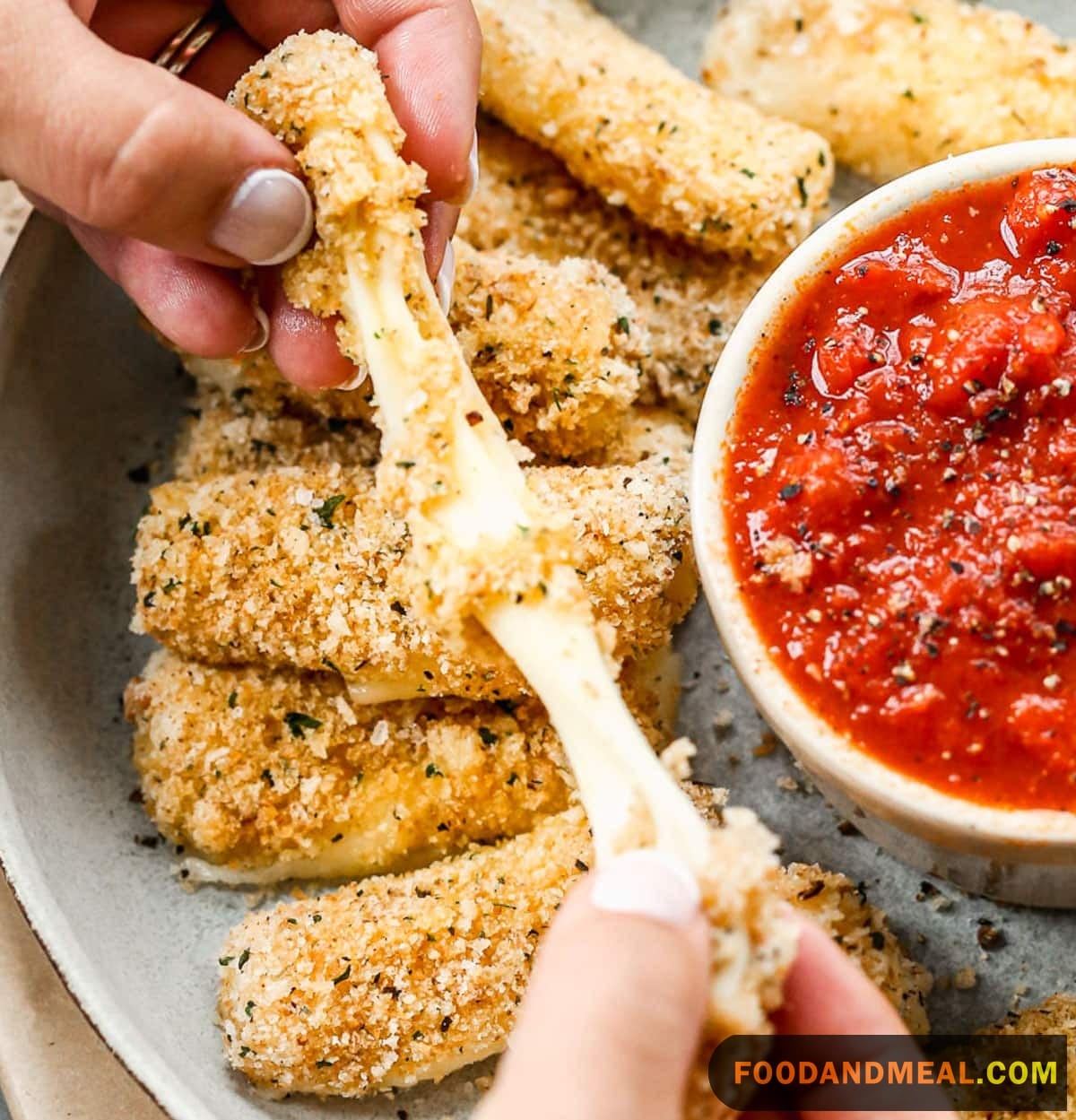 Dip, dive, delight! Mozzarella Sticks with a trio of tantalizing dips.