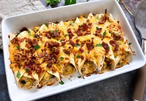 Creamy Bacon And Egg Breakfast Enchiladas