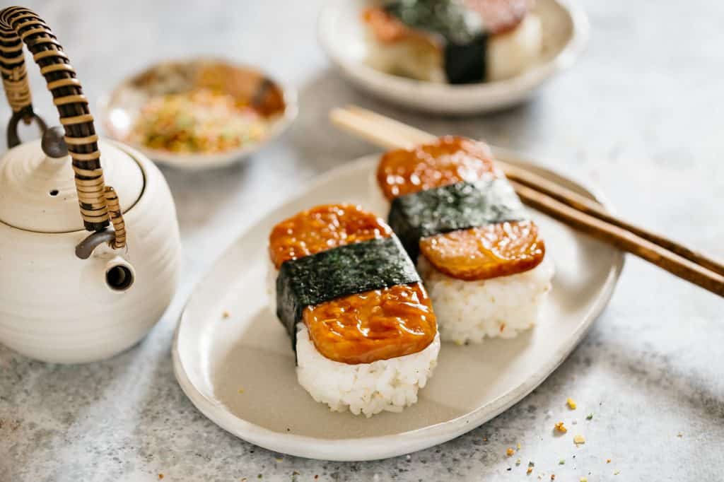 Pairing Spam Musubi with a refreshing cucumber salad.