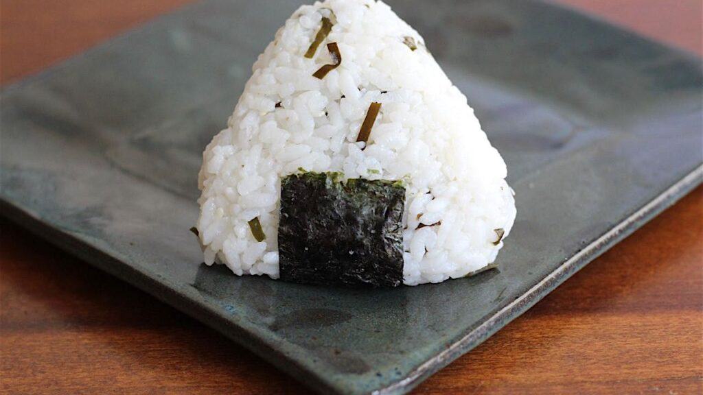 A culinary hug: Wrapped Onigiri ready for a meal on-the-go.