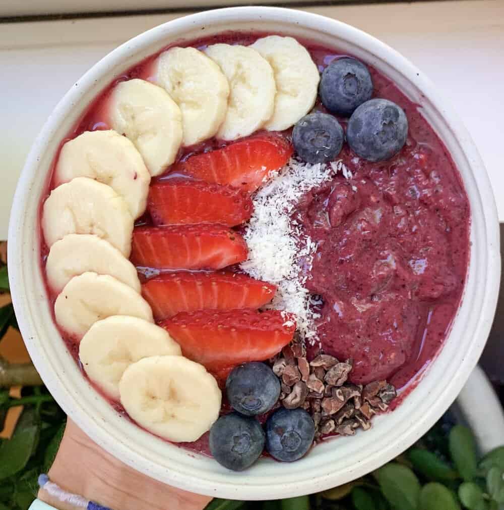 A creamy swirl: capturing the perfect consistency of the BLW Blueberry Smoothie Bowl.