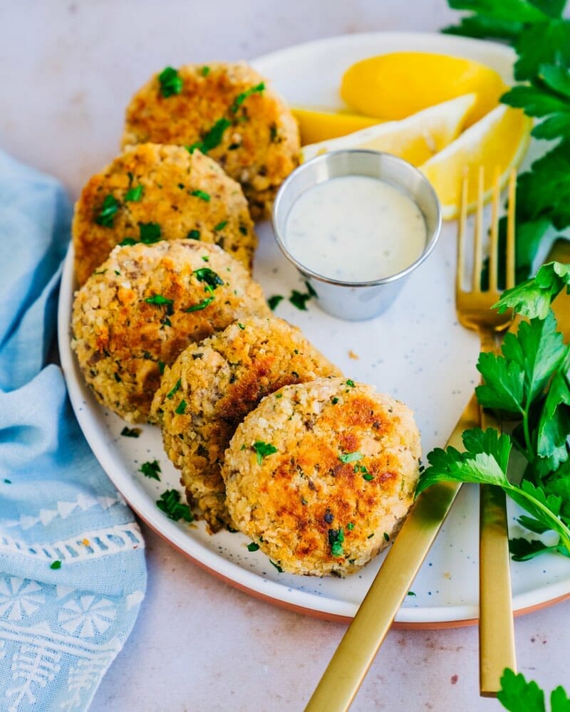 Image of salmon cakes being shaped: "Shaping love into delicate cakes—the essence of our Baby-Friendly Salmon Cakes recipe."