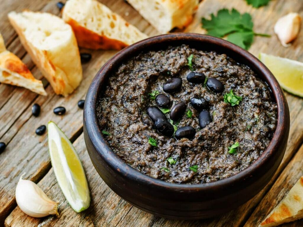 Dive into a world of flavors with every scoop of our irresistible Black Bean Hummus