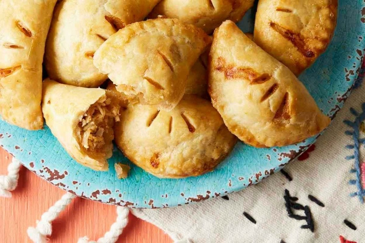 An Irresistible Spread Of Freshly Baked Empanadas – A Culinary Dream Come True.