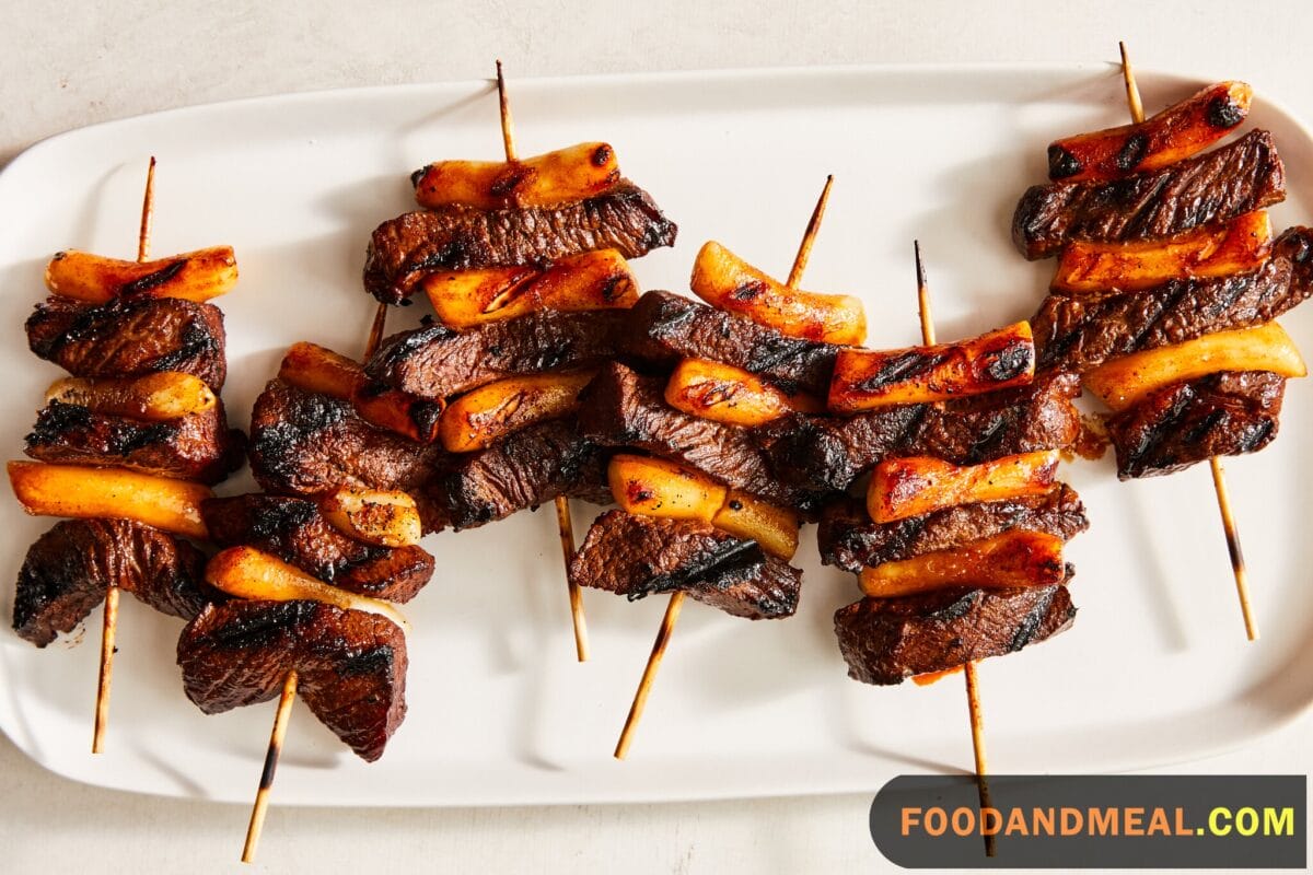 Beef Skewers With Rice Cakes And Scallions