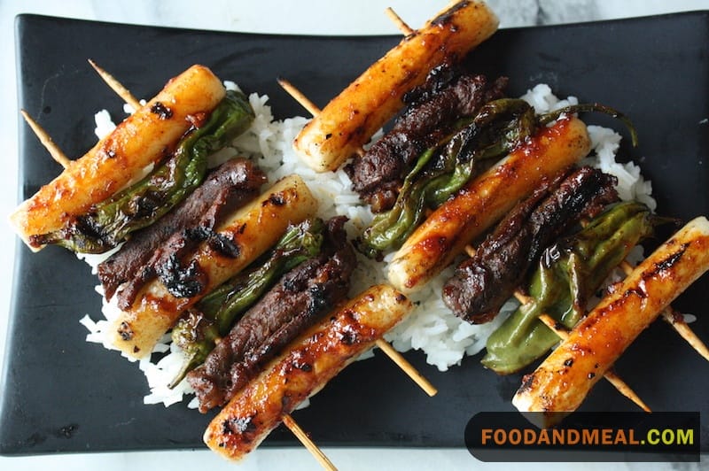 Beef Skewers With Rice Cakes And Scallions