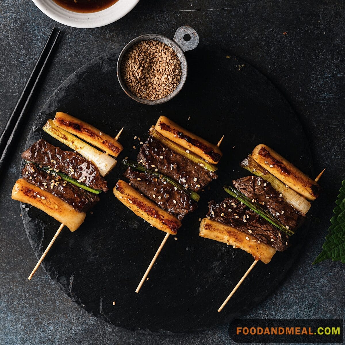 Beef Skewers With Rice Cakes And Scallions