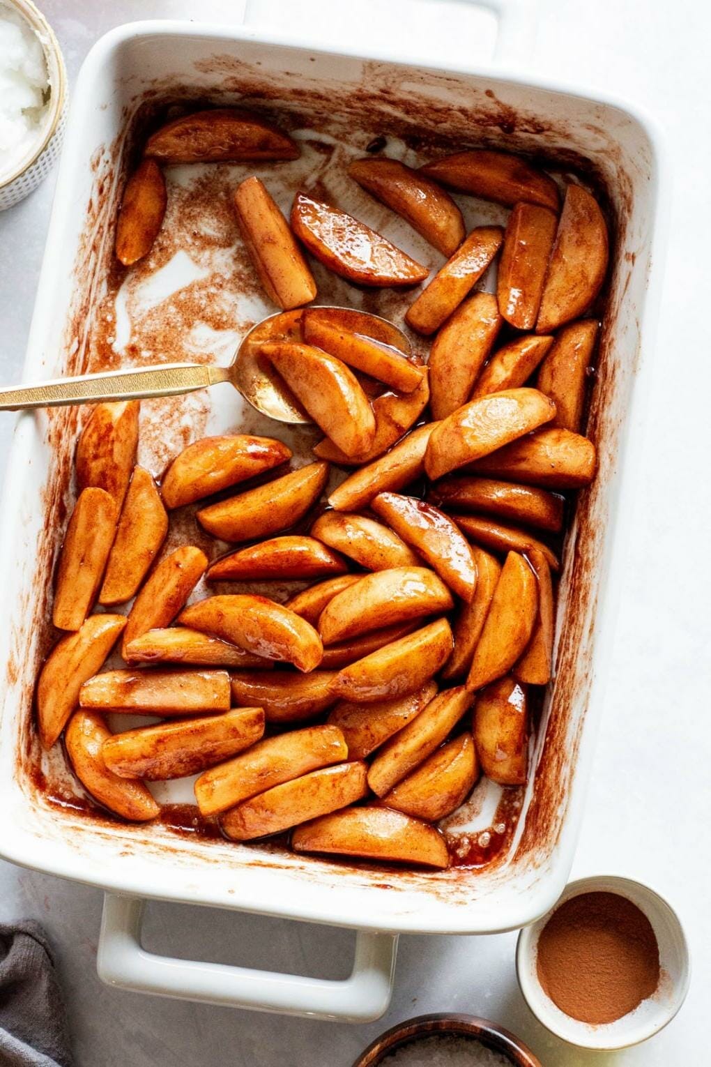 The Before Magic: Freshly Sliced Apples Awaiting Their Cinnamon Transformation.