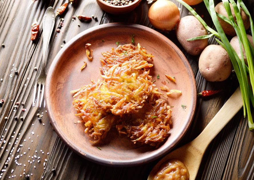 A Match Made In Heaven: Latkes Paired With Zesty Apple Sauce.