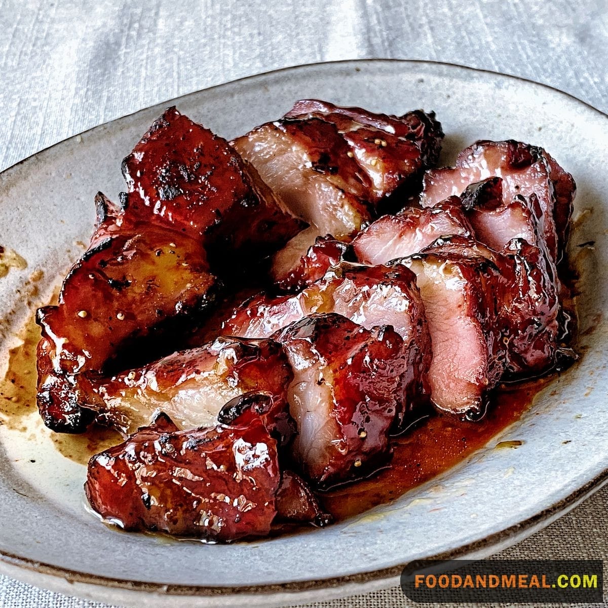 Delve Into The Sweet Flavors Of Char Siu Pork, Where The Bbq Glaze Enhances The Overall Taste.