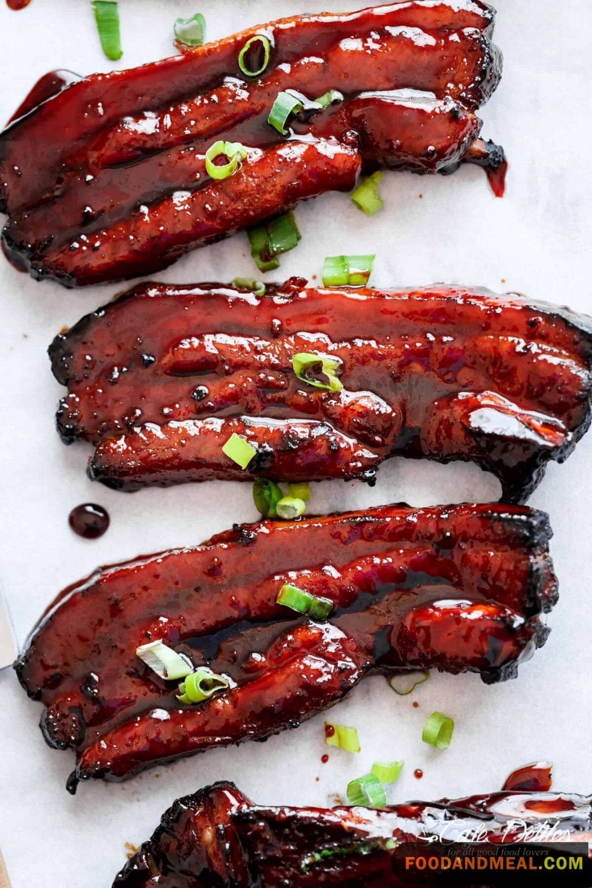 A Tantalizing Close-Up Of Succulent Char Siu Pork Showcasing Its Glossy Glaze.