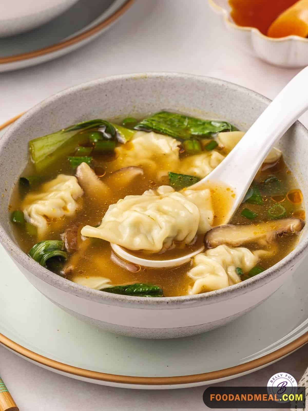 Dumpling Delight Bite Into These Tender Dumplings Filled With A Pork And Shrimp Mixture And Savor The Rich Broth. Wonton Soup Satisfaction.