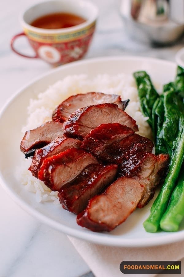  A Flavorful Composition Of Char Siu Pork Slices, Highlighting The Rich Blend Of Spices And Tender Meat.