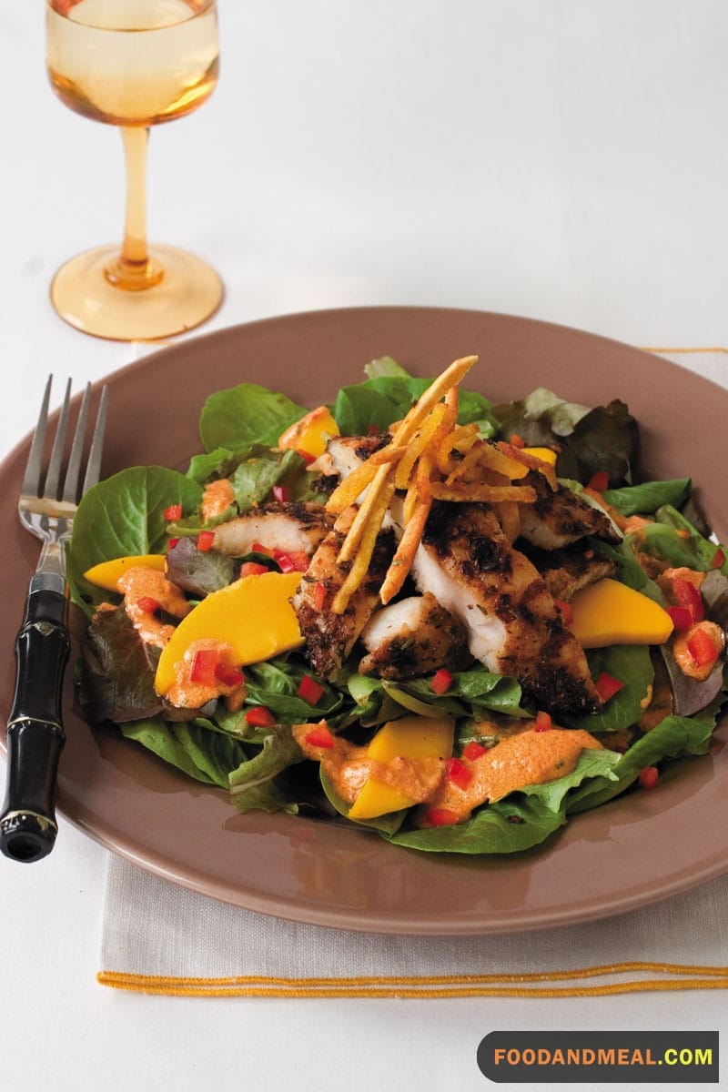 Catfish fillet on salad